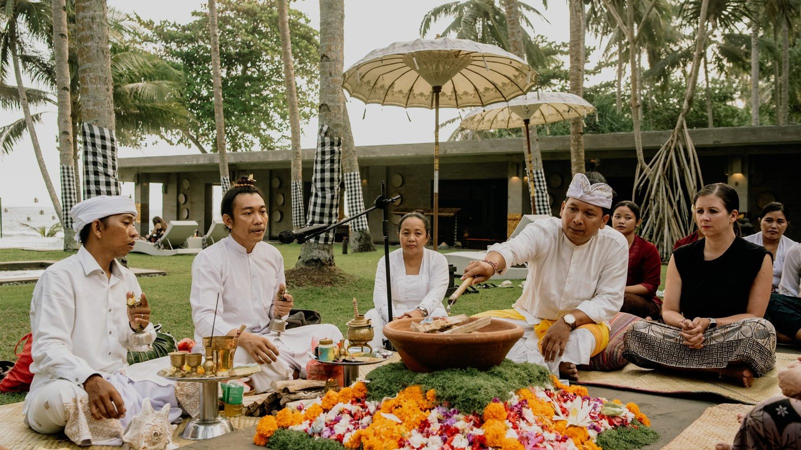 Priests leading a ceremony in a villa garden